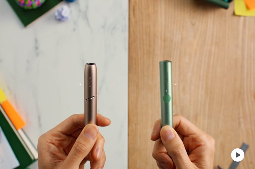 An IQOS 3 DUO Holder compared to an IQOS ILUMA Holder.